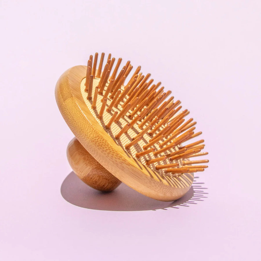 Bamboo scalp massager for hair growth, a plastic-free natural hair care tool by Humby Organics