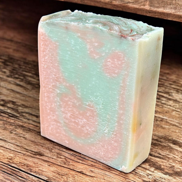 Olive Wood and Cypress handcrafted bar soap by Monticello Soap Company, mint green and peach swirl with earthy cypress and olive wood notes.