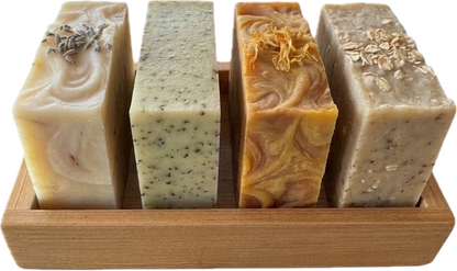 Bamboo cradle tray holding handmade soap bars