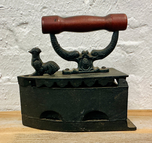 Antique Cast Iron Coal Iron with a Rooster Clasp