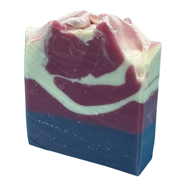Black Raspberry Vanilla handcrafted bar soap by Monticello Soap Company, indigo and berry red swirl with vanilla, plum wine, and orchid notes.