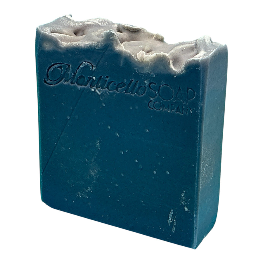 Bay Rum Face & Body Bar handcrafted by Monticello Soap Company, charcoal-detail bar with classic warm bay rum scent.
