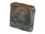 Woody Goat Milk handcrafted bar soap by Monticello Soap Company, side view of rugged goat milk bar.