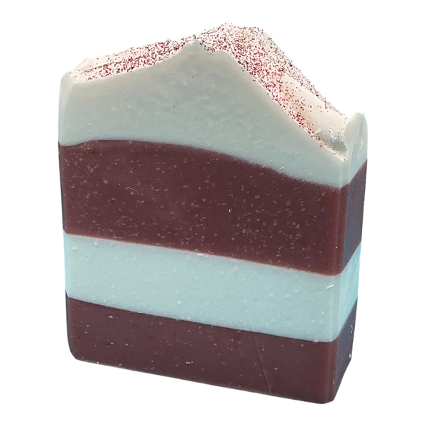 Candy Cane Lane handcrafted holiday bar soap by Monticello Soap Company, red and white peppermint vanilla bar.