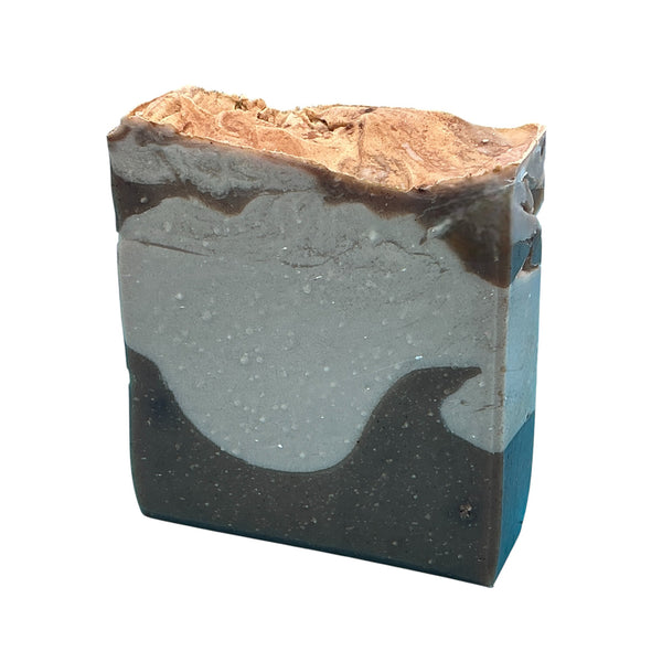 Rustic Mango and Coconut Milk handcrafted bar soap by Monticello Soap Company, golden turmeric-tinted tropical bar.