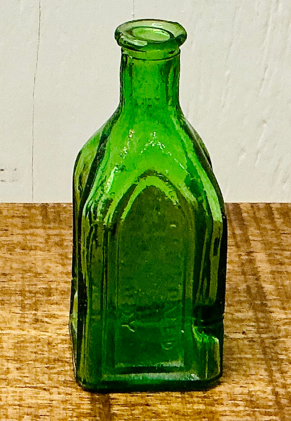 Miniature Vintage Green Glass Chief Wahoo Electric Tonic Bottle, vintage one-of-a-kind find from Monticello Soap Company