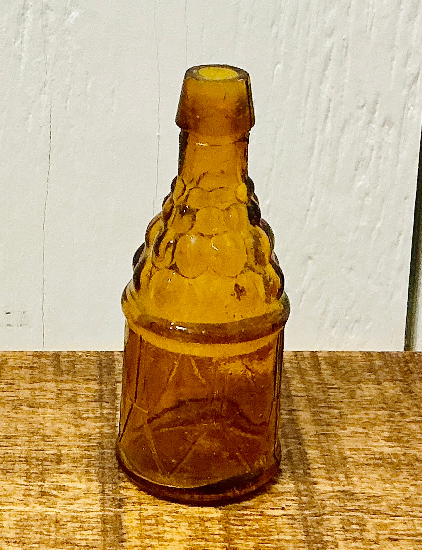Vintage Wheaton Amber Glass "Drum & Grapes" Bottle