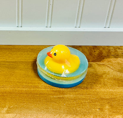 Ducky Soap handcrafted novelty bar by Monticello Soap Company, side view of melt-and-pour bar with rubber duck topper.
