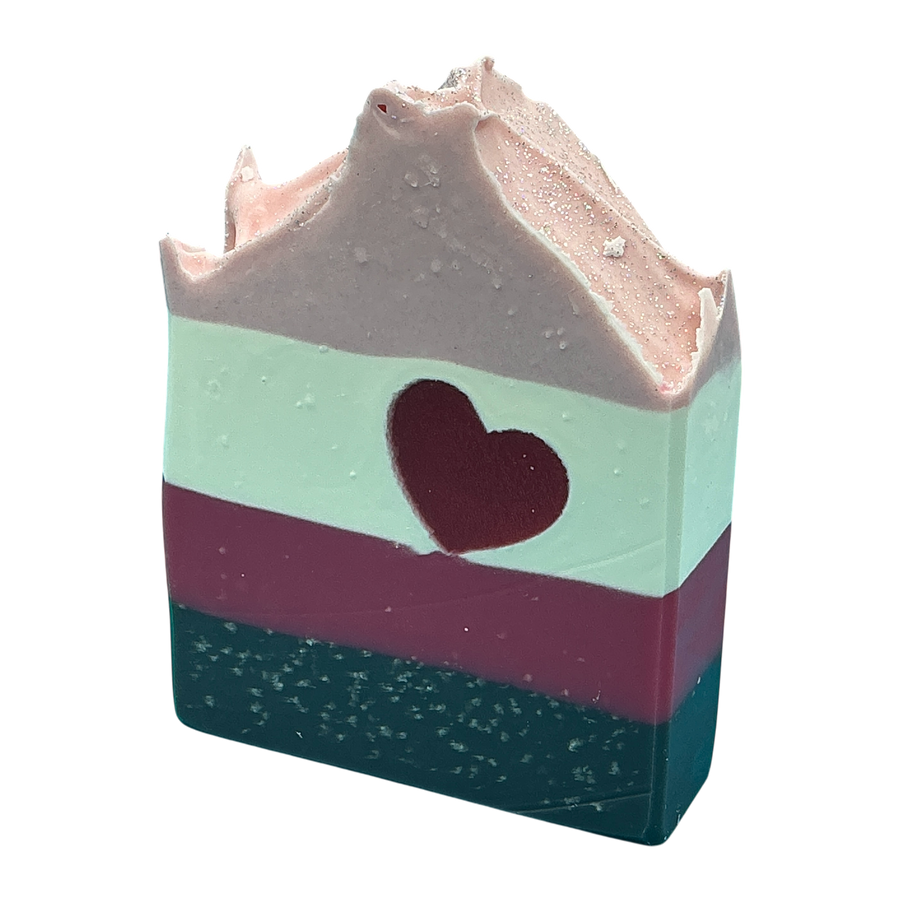 Love Potion No. 37 handcrafted bar soap by Monticello Soap Company, flirty Valentine's bar with charcoal and eco glitter detail.