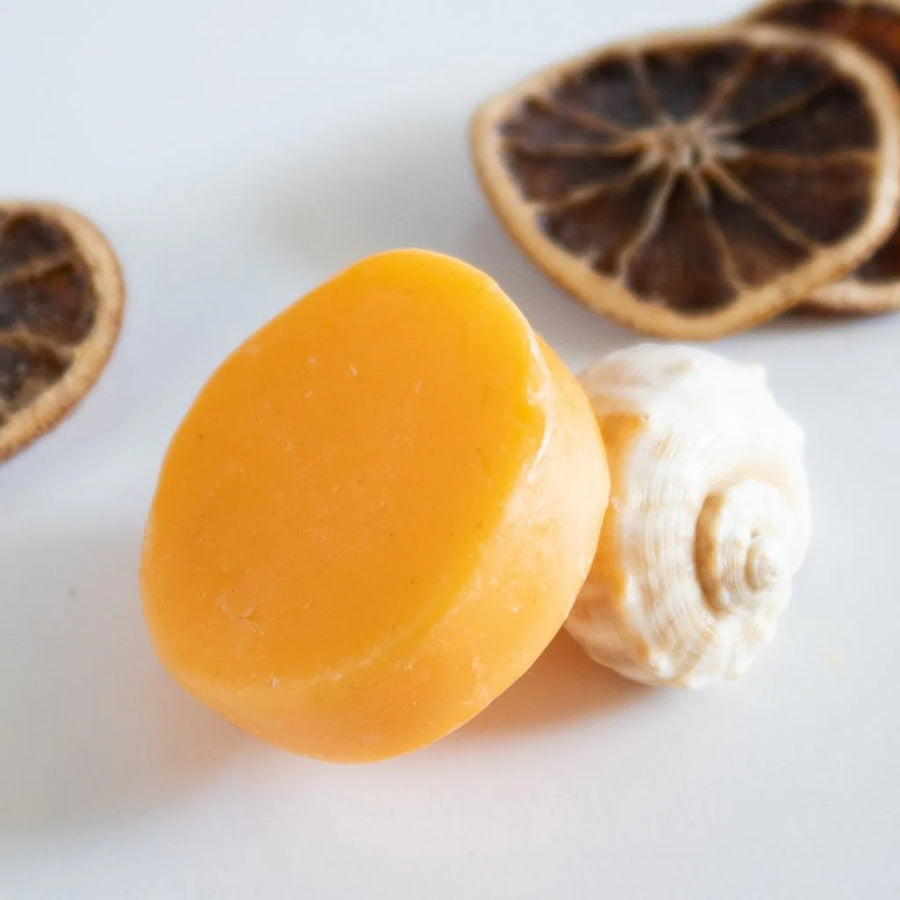 Orange Crush conditioner bar by Humby Organics, a vegan citrus conditioner bar for soft, shiny hair